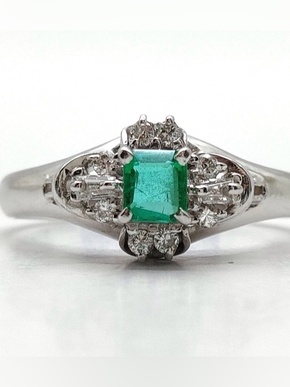 Natural Emerald and Diamond Halo Ring in Platinum Sz5.5